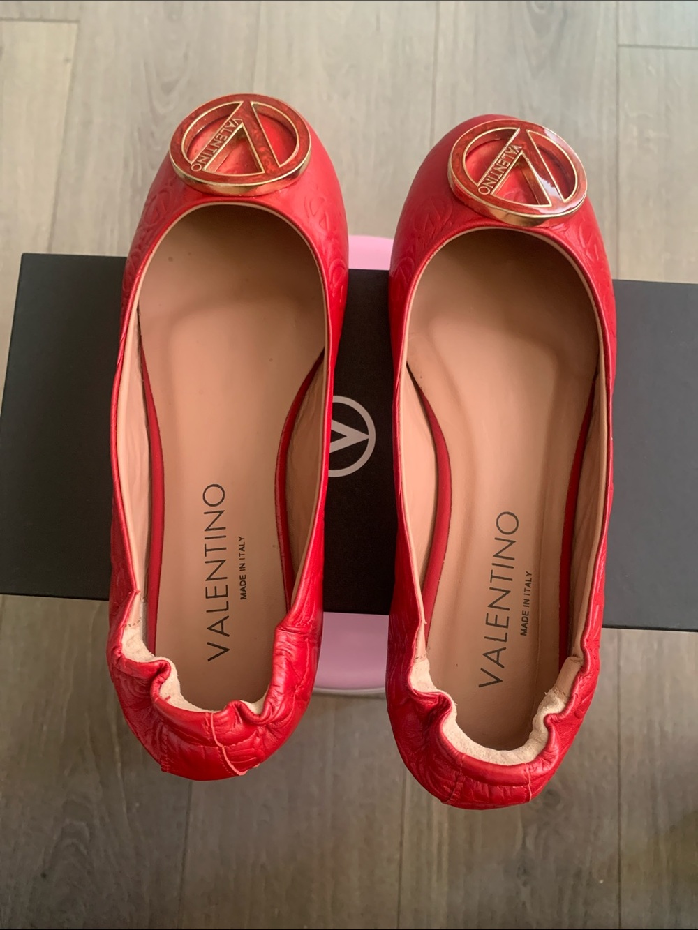 Valentino Red Quilted Logo Ballet Flats with Gold Emblem